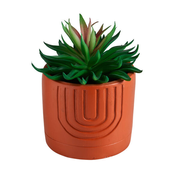 Plante verte artificielle et pot en ciment (terracotta)