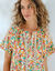Blouse manches courtes finitions en macramé, imprimée (écru / rose)