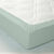 Drap-housse uni flanelle 130g/m&sup2; - bonnet 32 cm (vert amande)