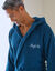 Peignoir mixte adulte col capuche éponge bouclette (bleu paon)
