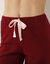 Broek met bloemenprint onderaan - katoenjersey (kersenrood)