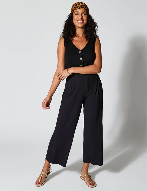 Pantalon large 7/8&egrave;me, taille &eacute;lastiqu&eacute;e, maille unie (noir)