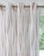 Paneelgordijn in voile met golvenmotief - afgewerkt met oogringetjes (terracotta)