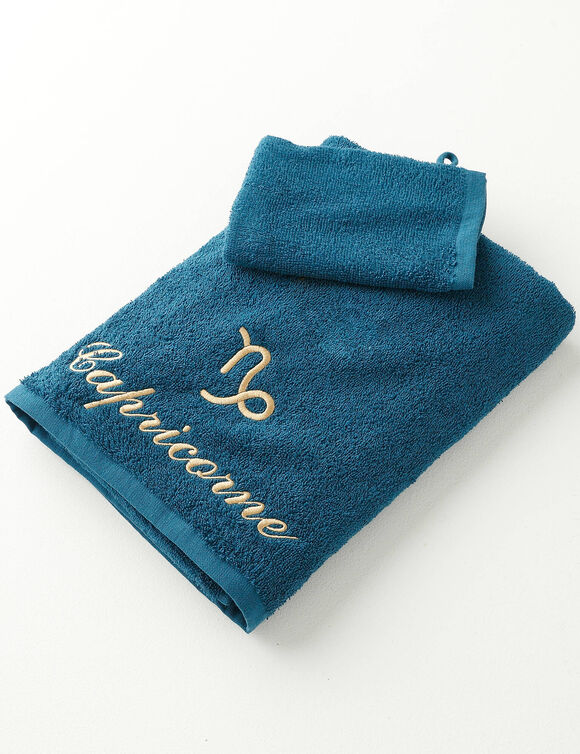 Serviettes de bain brodées Capricorne - 420g/m2 (pauwblauw)