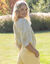 Ruime broek met plooien en hoge taille, effen (vanille)
