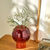 Bolvormige vaas in gekleurd glas, 17 cm hoog (granaatrood)