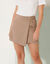 Soepele, asymmetrische shortrok (taupe)