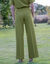 Ruime broek met plooien en hoge taille, effen (mosgroen)