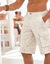 Bermuda in canvas met bladerenprint (beige)