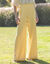 Ruime broek met plooien en hoge taille, effen (vanille)