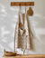 Vlekwerende schort met geometrische print (beige / wit)