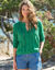 Vest met knopen, ronde hals en geschulpte afwerking, ajourtricot (groen)