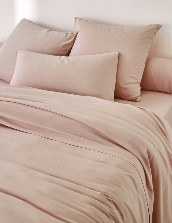 Effen bedlinnen in bamboe en linnen** (zachtroze)
