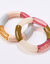Elastische armband met buisvormige parels, set van 2 (roze / ecru)