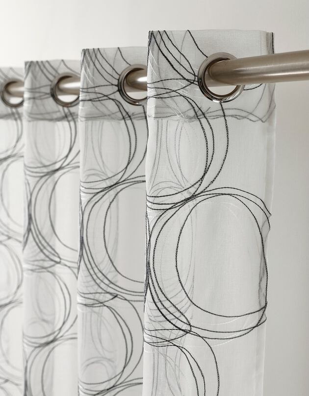Paneelgordijn in stamijnvoile met cirkelvormig borduursel, afgewerkt met oogringetjes (grijs)