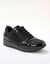 Tennisschoenen met verhoogde zool van LWG-gecertificeerd lakleer (zwart)