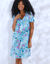 Robe courte évasée col V, imprimé floral (turquoise)