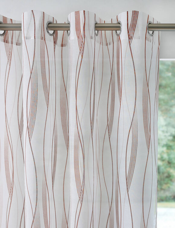 Paneelgordijn in voile met golvenmotief - afgewerkt met oogringetjes (terracotta)