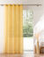 Paneelgordijn in effen voile, afgewerkt met oogringetjes (geel)
