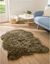 Tapis poils forme peau de bête (taupe)