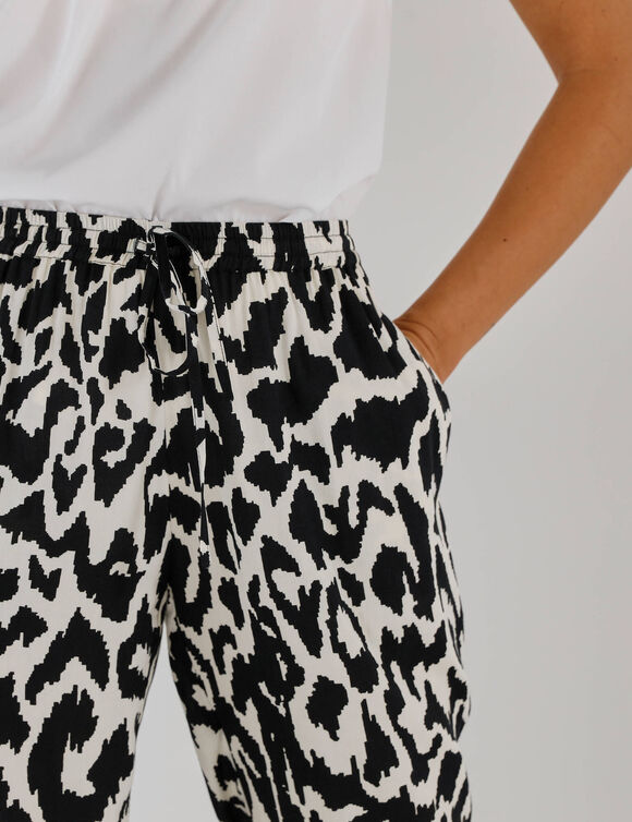 Tapered 7/8-broek met print (zwart / beige)