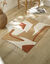 Rechthoekig tapijtje met grafische print (naturel / terracotta)