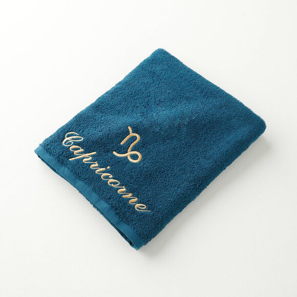 Serviettes de bain brodées Capricorne - 420g/m2 (bleu paon)