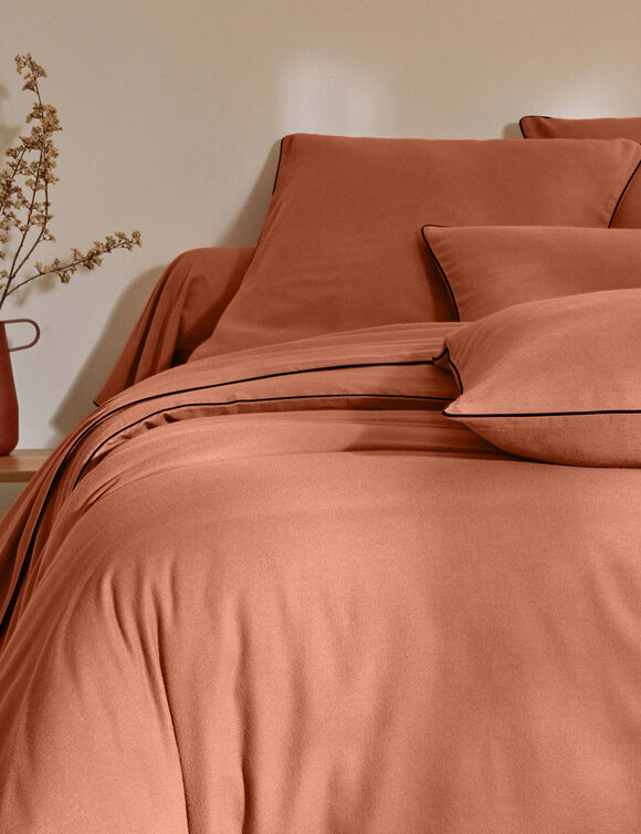 Effen bedlinnen in flanel met contrasterend biesje, 'Timeless' collectie  (tomette)