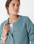 Vest met knopen in patenttricot (celadongrijs)
