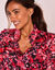 Blouse bedrukt met een kraag met ruches (pruim / rood)