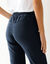 Modellerende jeans met 'platte buik' effect en elastische taille (raw)