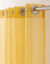 Paneelgordijn in effen voile, afgewerkt met oogringetjes (geel)