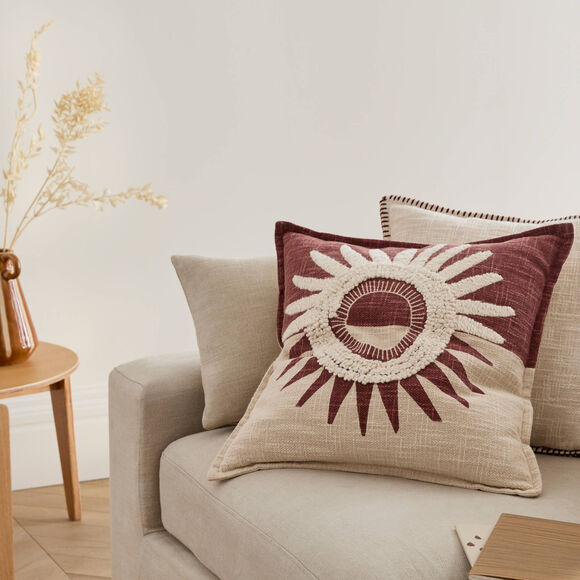 Coussin textur&eacute; motif soleil (bordeaux / &eacute;cru)
