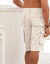 Bermuda in canvas met bladerenprint (beige)