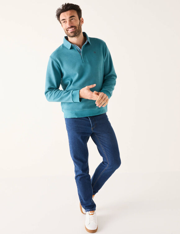 Warme sweater met polokraag, borduursel op de borst, in ribtricot (oceaanblauw)