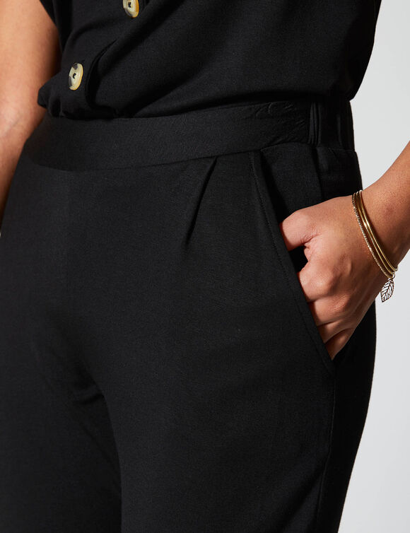 Pantalon fuselé uni, taille élastiquée (noir)