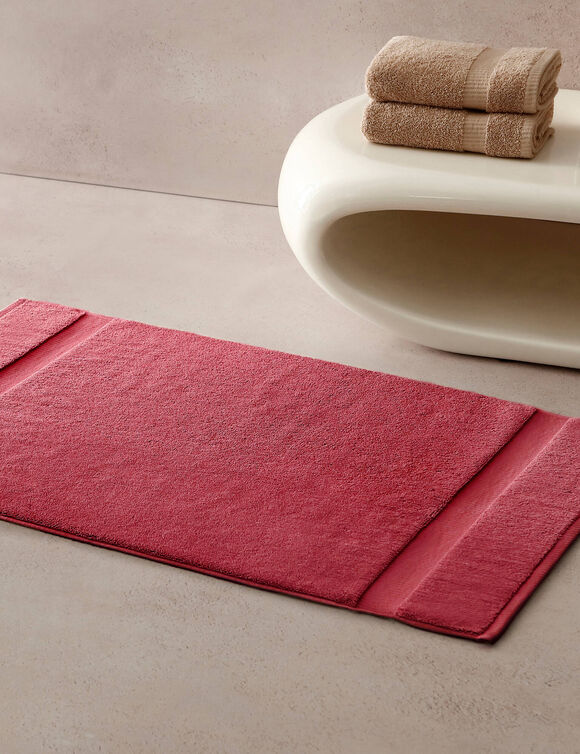 Badmatje van badstof met sierrand en premium comfort (granaatrood)
