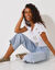 T-shirt met ronde hals, goudkleurige vlinderprint (wit)