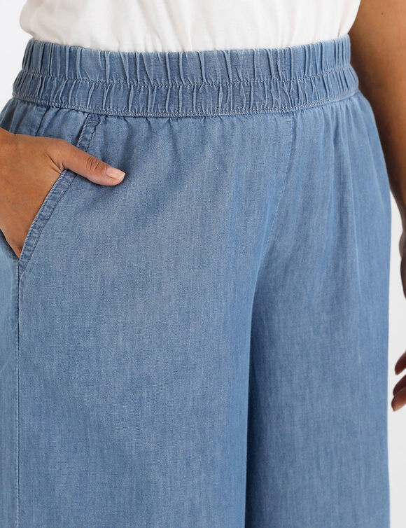 Mom fit jeans met knopen (bleached)