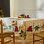 Tafellaken met hulst- en kerststerrenprint (naturel / rood)