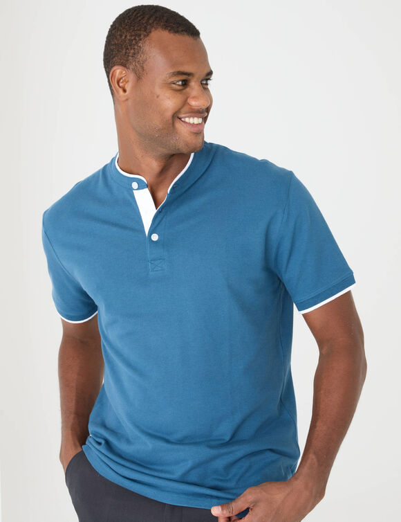 Effen polo in piquétricot, met maokraagje en korte mouwen (eendenblauw)