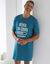 Bedrukt pyjamashirt in maximodel 'réveil en cours' (eendenblauw)