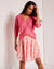 Gilet col V, maille ajourée (rose)