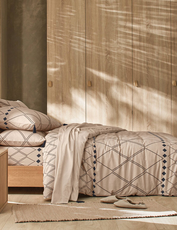 Linge de lit Massaï coton à motifs graphiques et finitions pompons (beige)