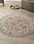 Tapis rond motifs perse (rose)