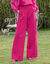 Ruime broek met plooien en hoge taille, effen (fuchsia)