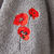 Torchons rond &eacute;ponge brod&eacute;e coquelicots - lot de 2 (gris)