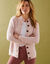 Cardigan in harig fantasietricot met knopen (poederroze)