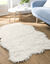 Tapis poils forme peau de b&ecirc;te (naturel)