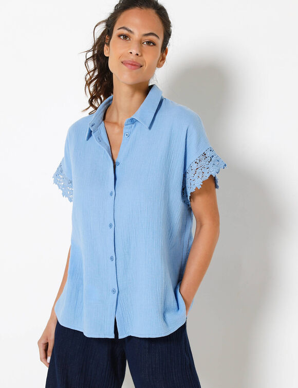 Bloes in crepon, met frontje, lange mouwen en borduursel (lichtblauw)